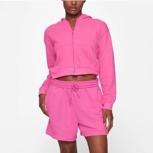 SKIMS Light French Terry Zip Up Hoodie and Lounge Short Set Sugar Pink